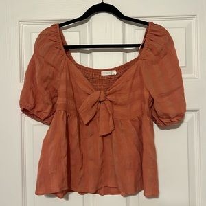 Lush Bow tie peplum top in orange